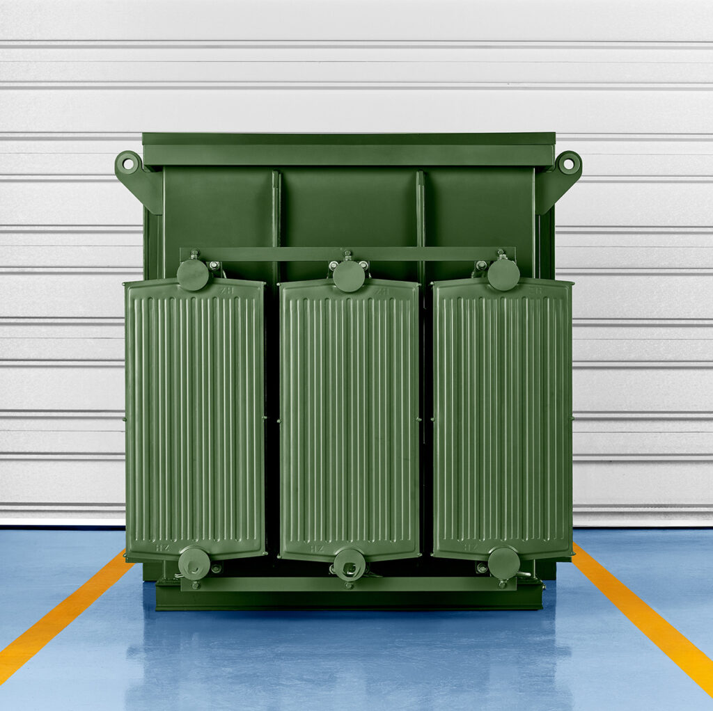Three-phase pad-mounted transformer, front view with external radiator panels